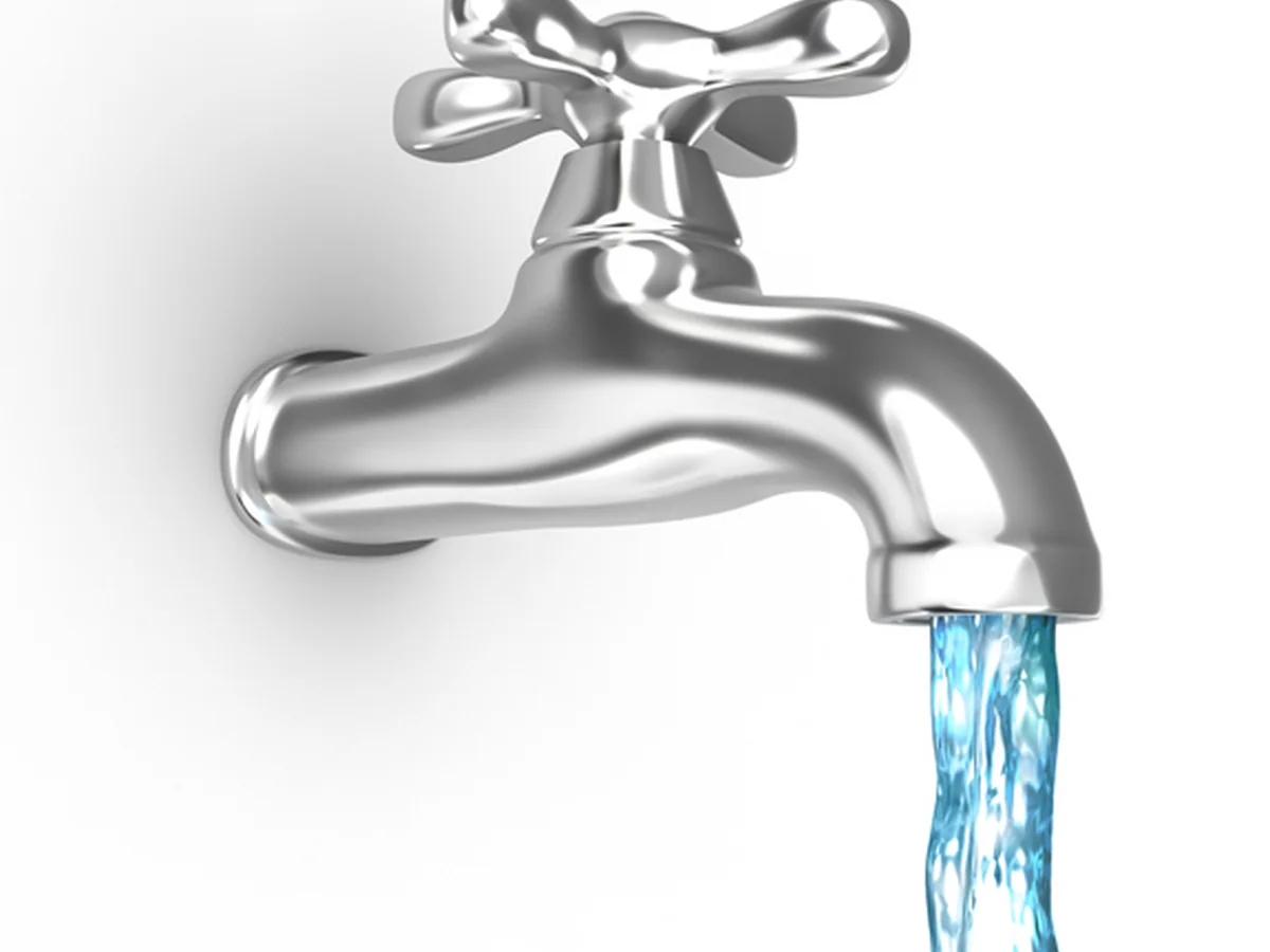 Clear water flowing from a household faucet